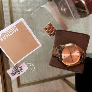 Like new rose gold Michael Kors watch